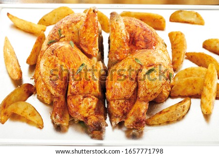 Grilled chicken with potato wedges