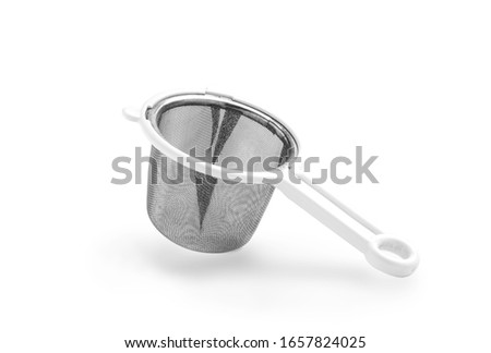 Isolated of metallic colander for cooking on white background.