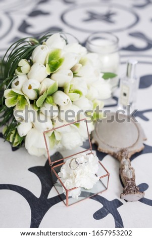 beautiful wedding decor bridal bouquet and wedding rings