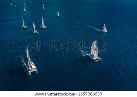 Regatta in the Indian Ocean, monohulls and catamarans Royalty-Free Stock Photo #1657986559