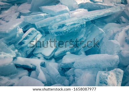 Pure ice pieces view of Olkhon Island frozen coast, Baikal Lake, Russia