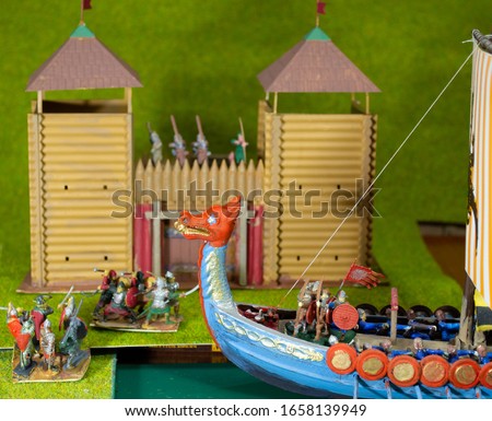 Viking ship. Models and figures for the war game. Vikings are warriors