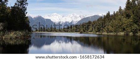 Lake Matheson mountain reflection at Franz Josef Glacier in Westland Tai Poutini National Park, New Zealand.