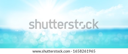 Summer tropical sea with sparkling waves and blue sunny sky. Wide template background