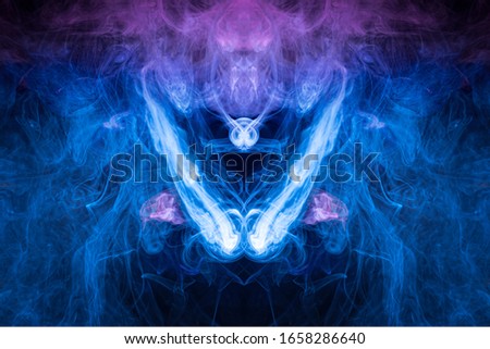 Pattern, Neon pink, blue  and  purple smoke in the  on a dark isolated background. Background from the smoke of vape
