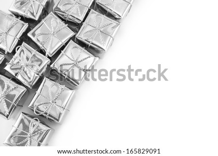 Many silver gifts on white background
