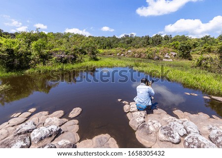 Photographer in the beautiful landscape,photographer taking photo