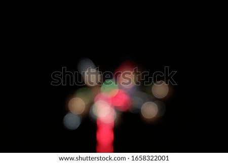 Fireworks in blurred focus. Black background