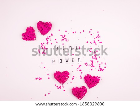 Girl Power Equality Feminist Women's Right Concept on light background with heart. World