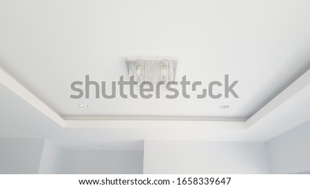 Modern white ceiling of the house being built. Royalty-Free Stock Photo #1658339647