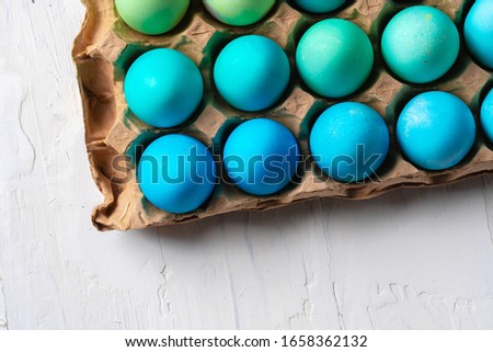 Still life photo of lots of colourful  Easter eggs
