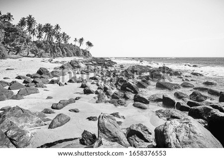 Black and white picture of a rocky beach, Sri Lanka.
