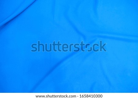 Texture, background. template. Silk fabric blue, Blue silk drapery and upholstery fabric 
