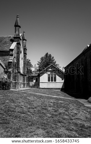 Outdoor black and white photo of old buildings