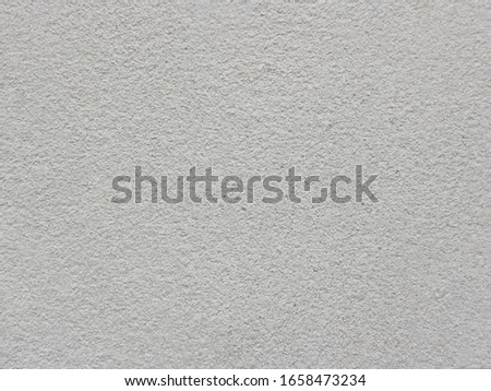 Cement wall that has not been painted                               