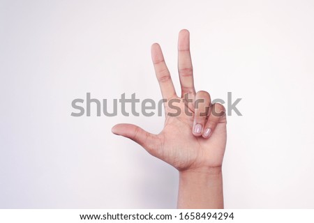 Woman hand sign isolated on white background