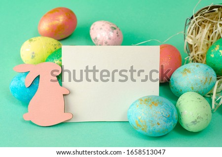 background with Easter bunny and colored eggs with card for text. copy space. isolated. Ester concept. Holiday greeting card for Easter!