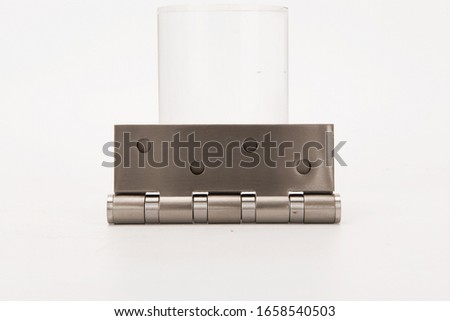 Metal spring butt hinge on a white background