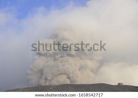 volcanic smoke from mount Aso in Kumamoto, Japan