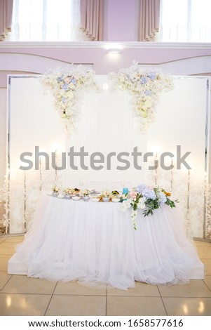 Wedding table for newlyweds with beautiful decorations