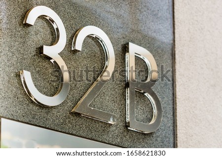 Close up of house number 32 B