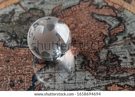 World globe and world map centered on China (coronavirus image)