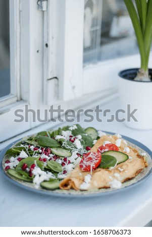 Delicious Vegetable and fried Eggs Breakfast Stock Photo 