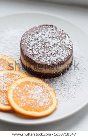 Vegan Raw Chocolate and orange cake. Healthy food Stock Photo