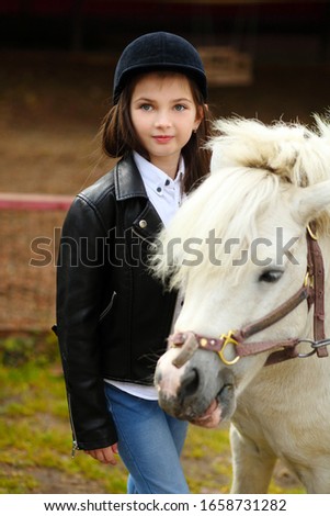 Portrait of girl and white Horse