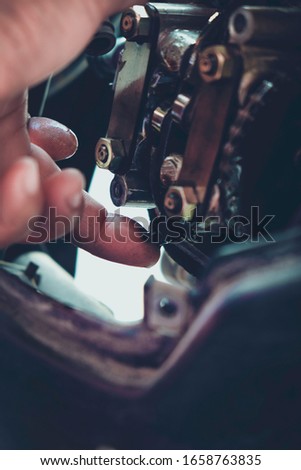 
Mechanic set the motorcycle engine cylinder head valve