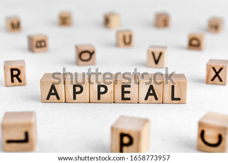 Appeal - words from wooden blocks with letters, a serious or urgent request appeal concept, white background Royalty-Free Stock Photo #1658773957