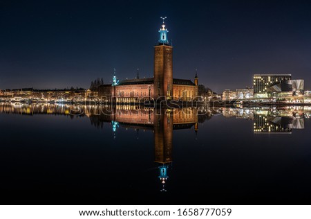 Picture of Stromsborg and Stockholm City Hall at night.