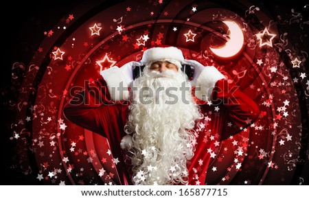 Image of Santa Claus in red costume wearing earphones