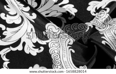 texture, background, black silk fabric with a monogram pattern Exquisite pattern of filigree fabric your design will delight you for a long time