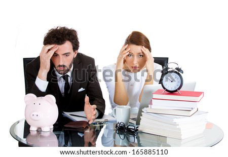 Closeup portrait of attractive couple, handsome man, beautiful woman, looking distressed from financial problems, mounting bills, isolated on white background. Good, bad finance decision. Bank mistake Royalty-Free Stock Photo #165885110