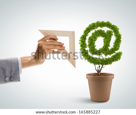 Image of pot plant shaped like at symbol