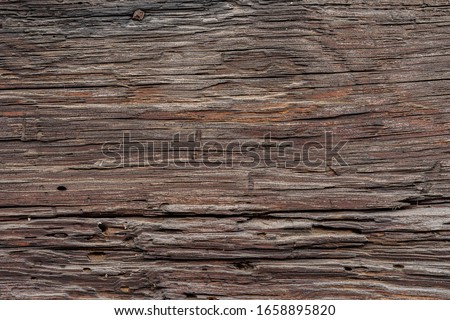 Texture od wooden planks. Wall made of antique wood. Raw wood after years. Royalty-Free Stock Photo #1658895820