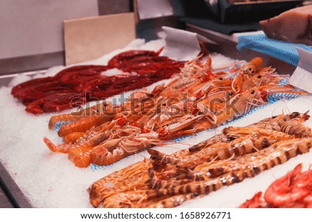 Stock photo of a market stand full of marine products like a crustaceans