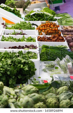Stock photo of a market stall full of vegetables and agricultural products