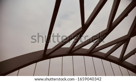 Traditional concrete structures of a bridge with sky background