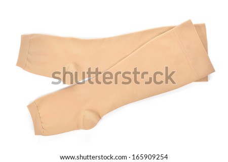 Knee-high medical compression stockings isolated on white background. For the treatment of varicose veins.