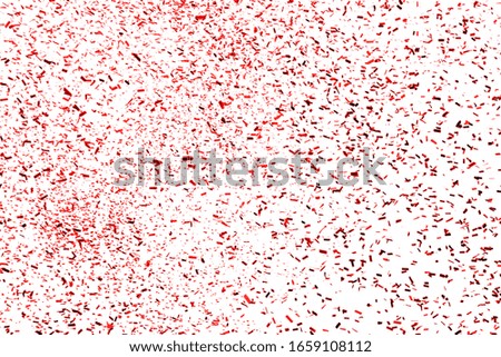 Thousands of confetti fired on air during a festival. Image ideal for backgrounds. Red are the confetti in the picture. White background. Smoke and shades