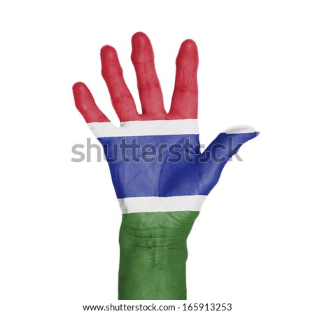Palm of a woman hand, painted with flag of Gambia