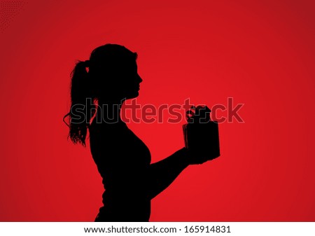 Silhouette of young woman with gift over red background