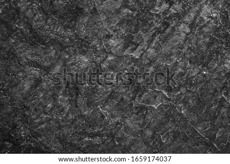 black stone background,black slate stone abstract background or texture