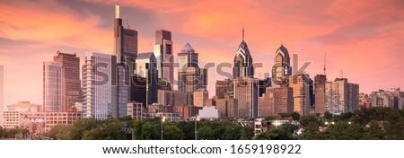 Downtown city skyline panoramic view of Philadelphia Pennsylvania USA over the Schuylkill River and boardwalk
