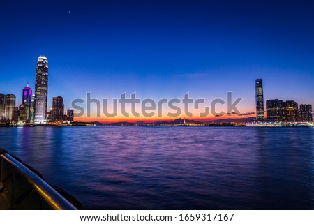 Hong Kong harbour side at sun set magic hour