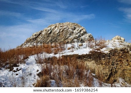 Frozen rocks of Olkhon Island, Baykal Lake, Russia