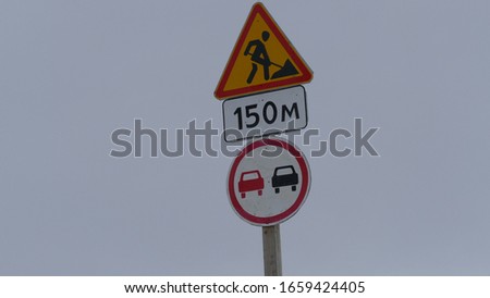 Traffic restriction road sign during repair work