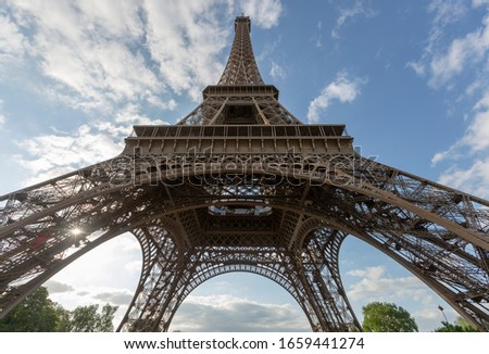 Eiffel Tower on blue sky background in autumn day. Paris Best Destinations. Travel in Europe Concept. Landmark, Sightseeing, Holidays and vacation in France. Panoramic View.